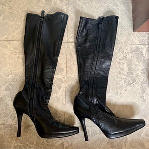 Knee high leather heeled boots